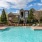 a pool with chairs around it