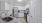 a kitchen with white cabinets