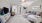a living room with a ceiling fan