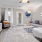 a living room with a ceiling fan