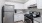 a kitchen with white cabinets