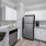 a kitchen with white cabinets