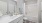 a bathroom with a tub sink and toilet